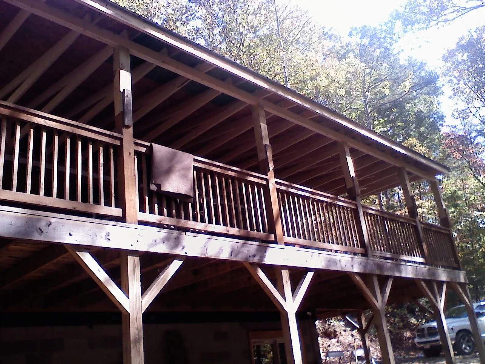 Timber framing under a new elevated porch and deck — Roof Leak Repair in Scandia by Roofing Brothers